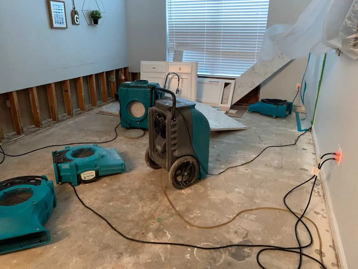 Dehumidifier in flood-cut room for Water Damage Restoration in Great Falls